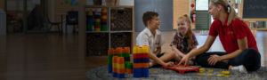 Good Shepherd Hoxton Park Teacher with students playing blocks