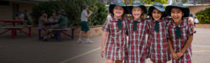 Good Shepherd Hoxton Park students standing on school grounds